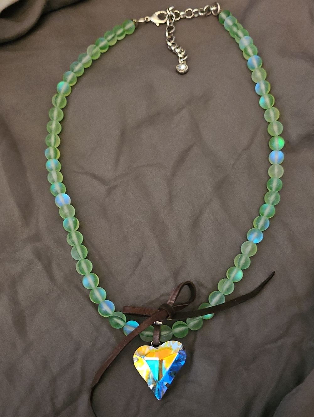 Green Beaded Necklace with Iridescent Blue Heart Pendant